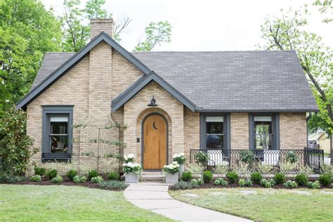 yellow brick house with metal roof|yellow brick exterior design.